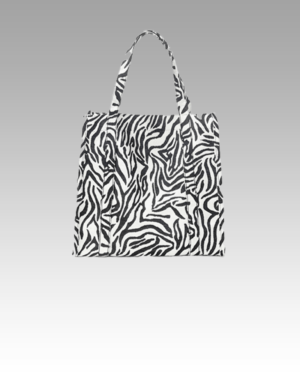 Léa-sac-à-main-fourre-tout-imprimé-zèbre-femme-boutique-izamel.png Sac à main Léa imprimé zèbre - Accessoire tendance pour femmes chez Izamel.