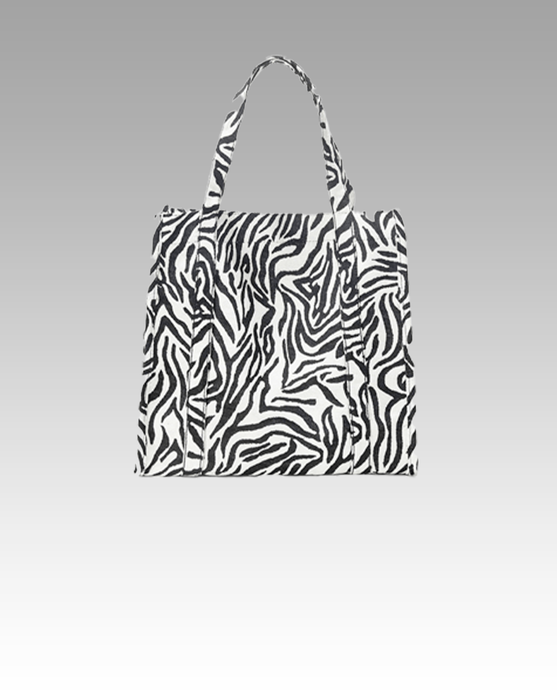 Sac à main Léa imprimé zèbre - Accessoire tendance pour femmes chez Izamel.