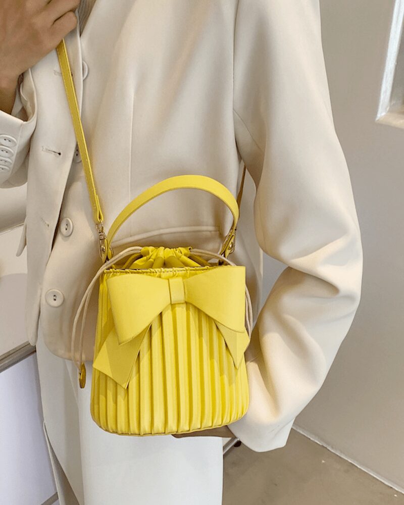 Sac à main Alexia jaune - Accessoire éclatant porté sur l'épaule pour femmes chez Izamel.