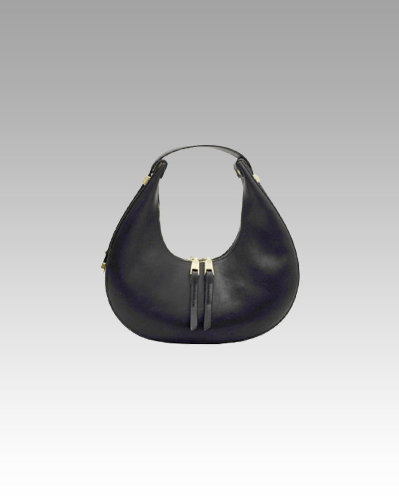 Découvrez le sac à main en similicuir noir Palma, une déclaration de style, disponible chez Izamel - la boutique de référence pour les fashionistas à la recherche d'élégance.