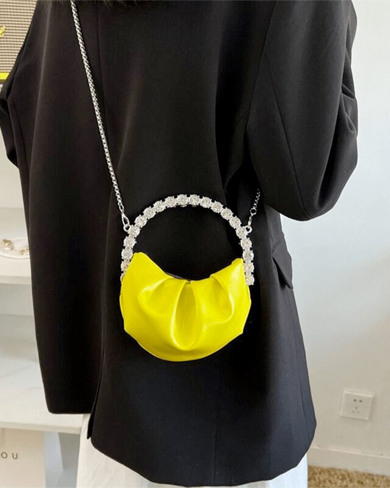 Sac à main similicuir jaune avec poignée strass - Accessoire de mode étincelant pour les femmes modernes.