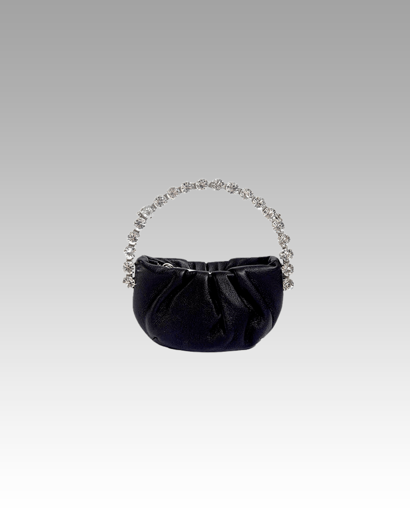 Découvrez le sac à main en similicuir noir avec une poignée scintillante de strass pour femmes, une touche de glamour chez Izamel.