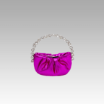 Découvrez l'élégance du sac à main en similicuir rose, sublimé par une poignée scintillante de strass, l'accessoire parfait pour les femmes chez Izamel.