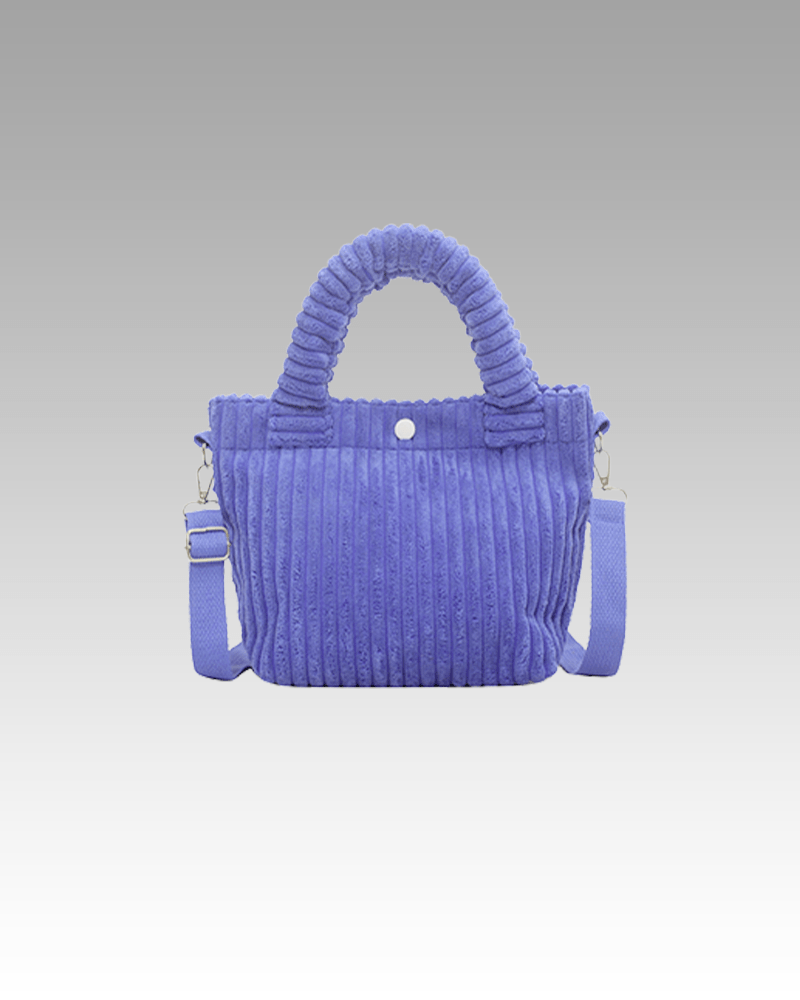 Découvrez le Daisy Sac à Main Fourre-Tout en Velours Côtelé Bleu Foncé chez Izamel, l'accessoire chic parfait pour compléter votre tenue avec une touche de sophistication.