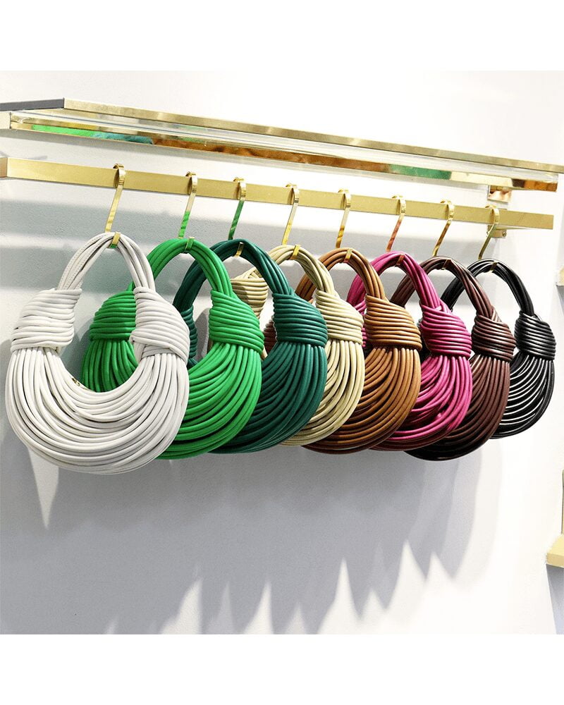 Sac à main Gaby tissé, proposé dans une gamme variée de couleurs.