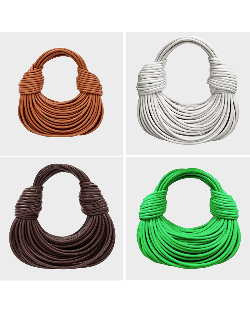 Sac à main tissé Gaby, disponible dans une variété de couleurs.