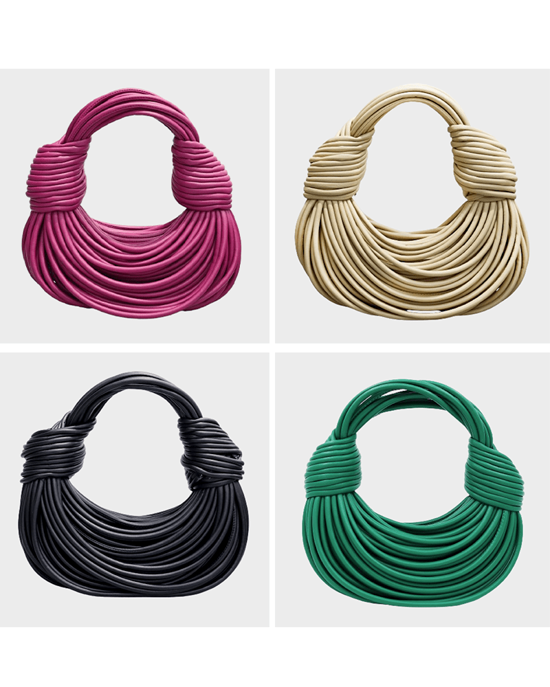Sac à main tissé Gaby, proposé dans une gamme variée de couleurs, tenu par une femme.
