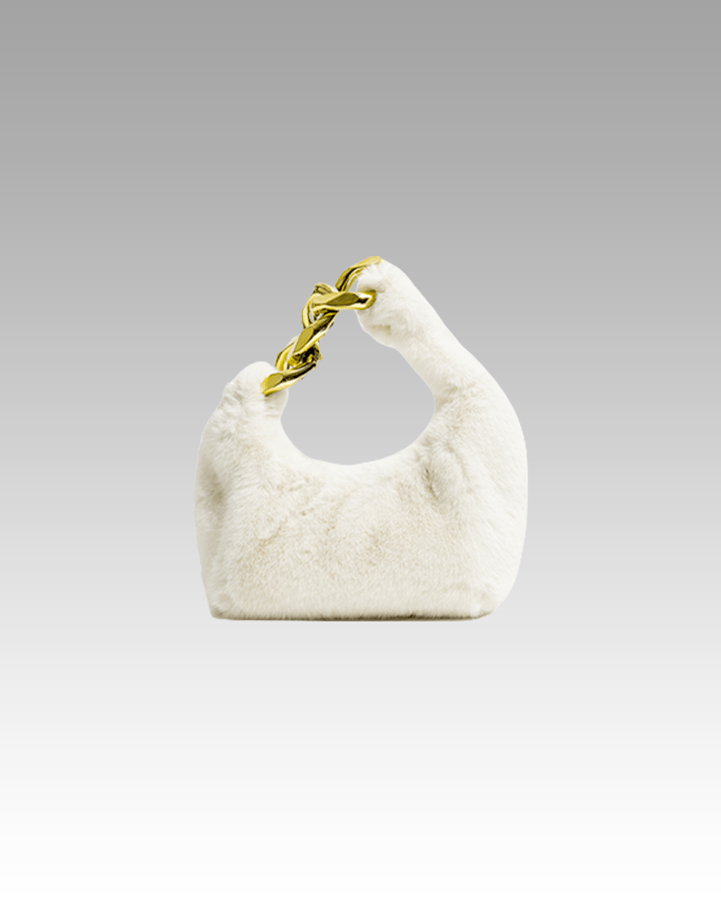 Sac à main Julie en fausse fourrure blanc - Accessoire de mode élégant disponible chez Izamel Boutique pour les femmes en quête d'élégance.