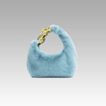 Sac à main Julie en fausse fourrure bleu - Accessoire de mode chic disponible chez Izamel Boutique pour les femmes en quête d'originalité.