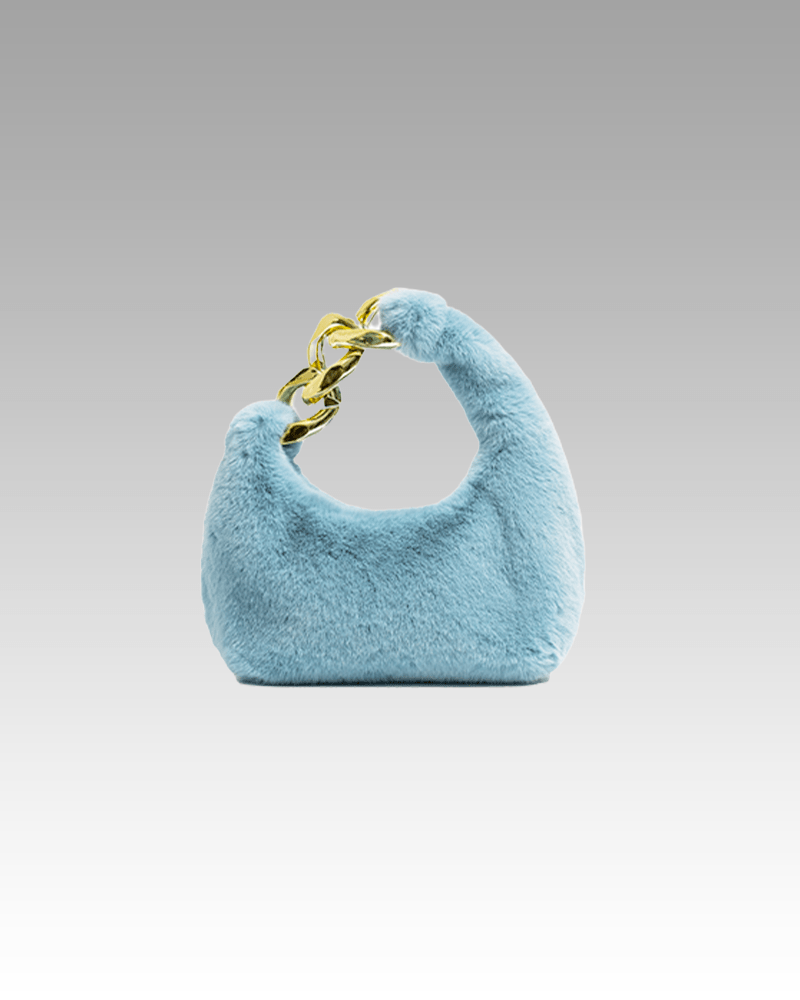 Sac à main Julie en fausse fourrure bleu - Accessoire de mode chic disponible chez Izamel Boutique pour les femmes en quête d'originalité.