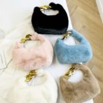 Sac à main Julie en fausse fourrure - Diversité de couleurs pour un accessoire de mode élégant et pratique.