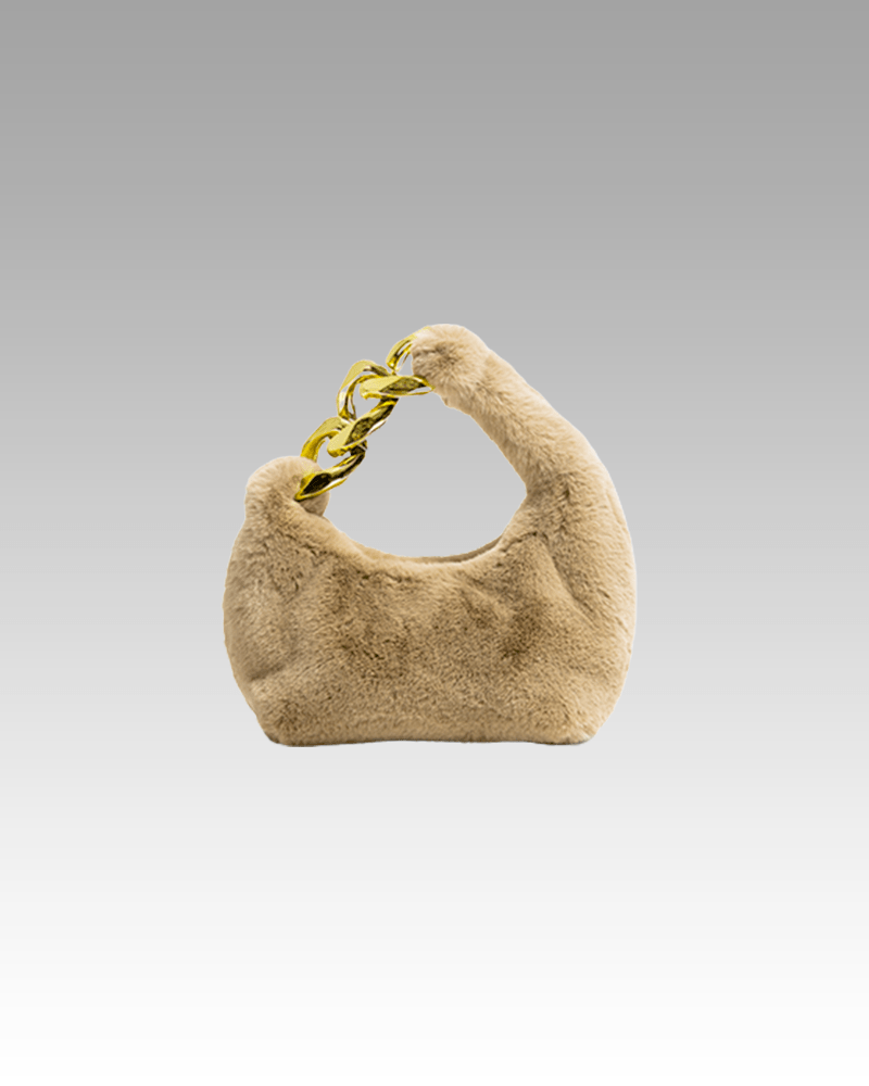 Sac à main Julie en fausse fourrure marron - Accessoire de mode chic disponible chez Izamel Boutique pour les femmes soucieuses de leur style.