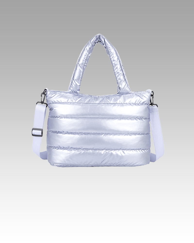 Sac à main matelassé Lara bleu, disponible dans la boutique Izamel pour femmes.