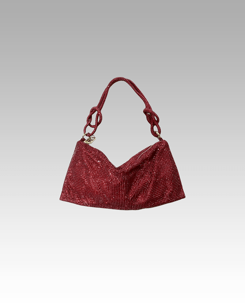 Sac à main rouge orné de strass, porté à l'épaule, pour femme, disponible chez Izamel.