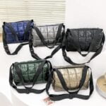 Sac à main matelassé Nelly présentant une variété de couleurs.