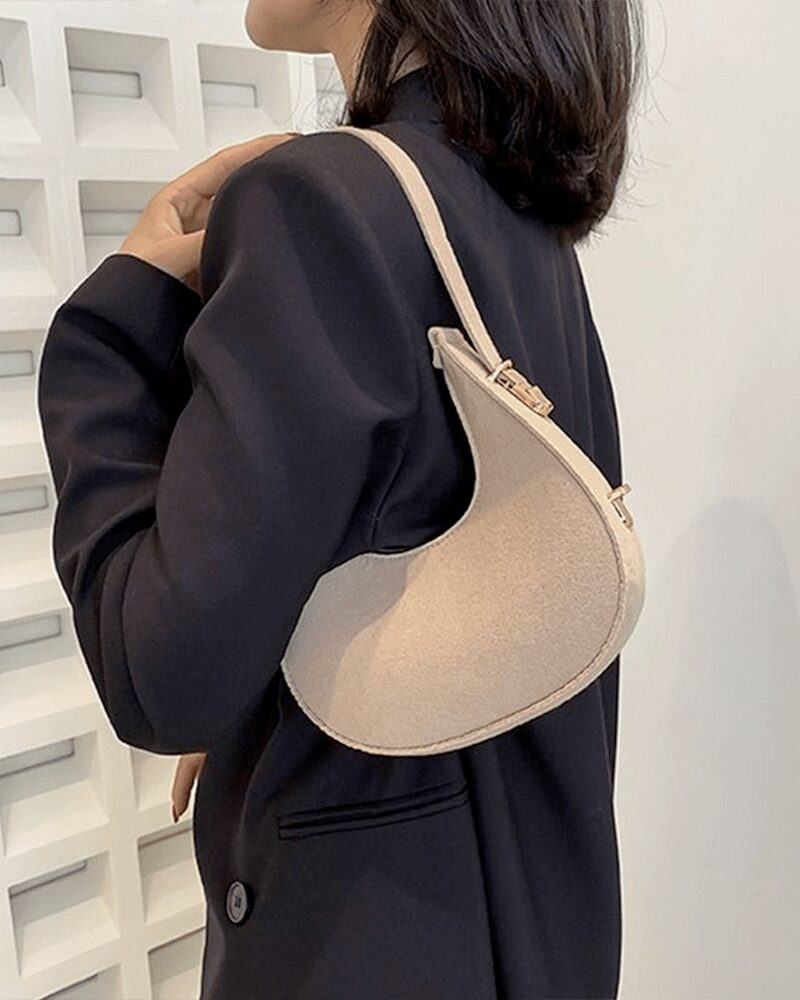 Selma sac à main beige pour femmes - Porté avec grâce à l'épaule.