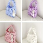 Vicky sac à main tricoté plusieurs couleurs variées.