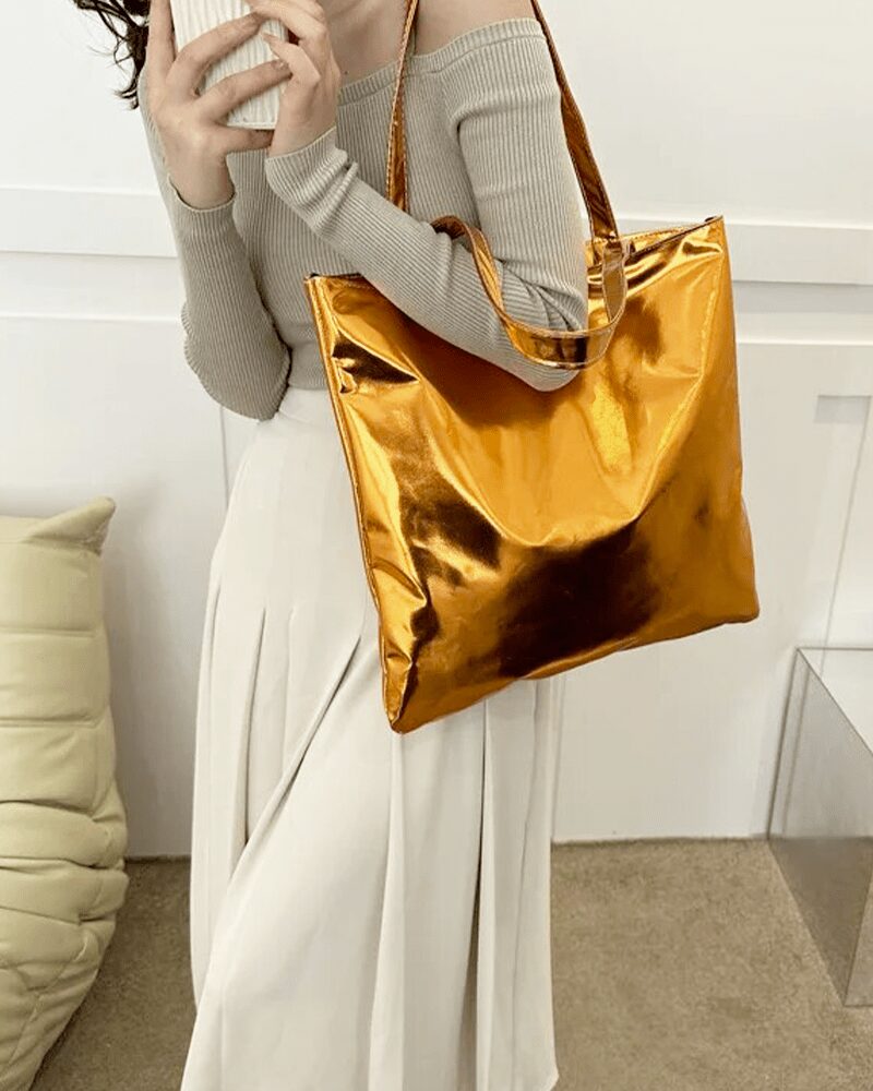Sac à main fourre-tout Elsa orange brillant - accessoire chic porté à l'épaule pour femme.