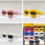 Lunettes de soleil originales Kelly, offrant une protection UV400, disponibles dans plusieurs couleurs variées chez Izamel.