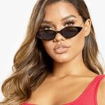 Femme portant les lunettes de soleil Lesly noir original UV400.